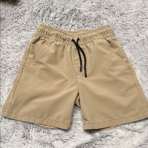 Cat and Jack above the knee quick dry pull on shorts. Boys size S (6-7).